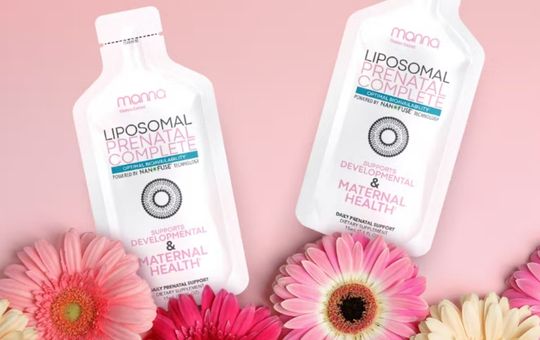 Flowers with two bottles of manna liposomal prenatal complete