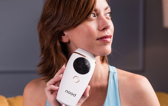 The nood flasher 2.0 being used on a womans face
