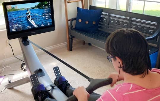 a beginner uses the hydrow smart rower