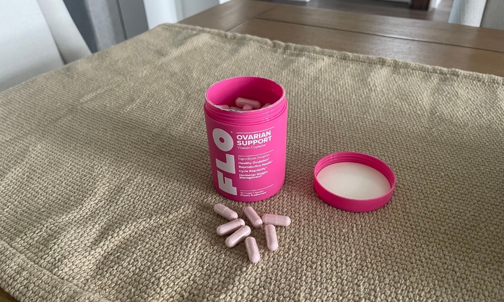 FLO ovarian support capsules on table